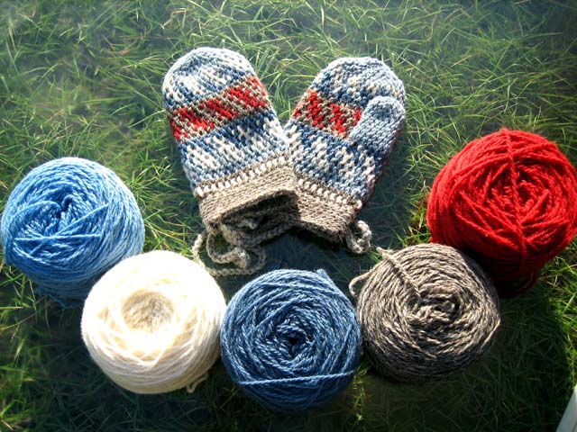 Kid's mittens and yarn balls